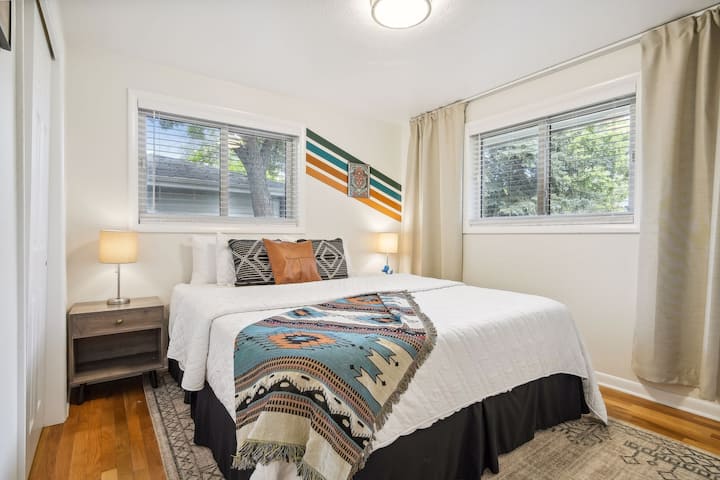 Cal-king bed with nightstand lights + cell phone outlet in the Chris Stapleton room. Main floor. 