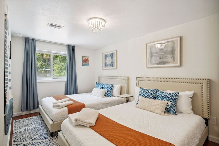 Full sized beds in the downstairs Jack Johnson room. Overlooking the backyard. Perfect for the kids. Lower level. 