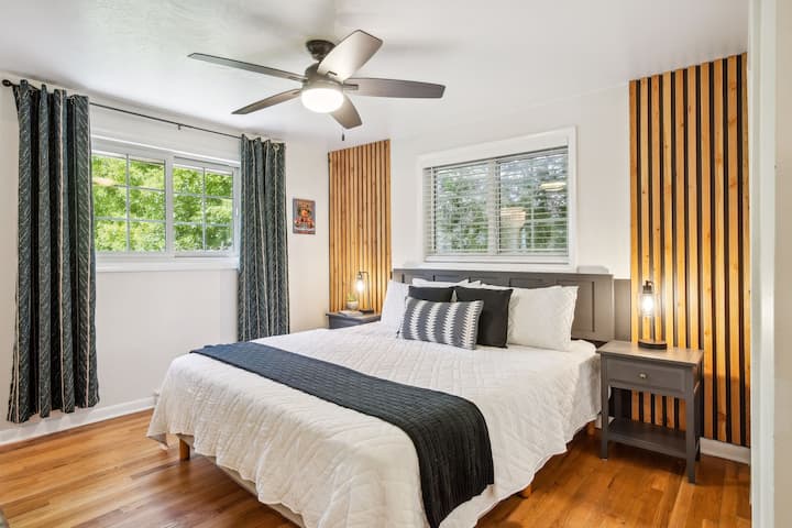 Master Suite- Fleetwood Mac room, overlooking the backyard with en suite full bathroom. Main floor. Cal-King sized bed.