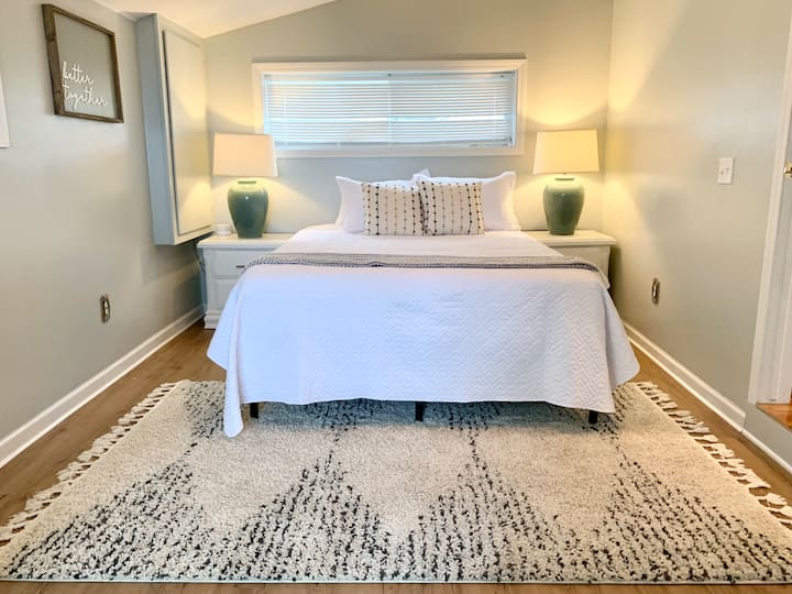 First floor bedroom with a queen. Small step down into the room. 