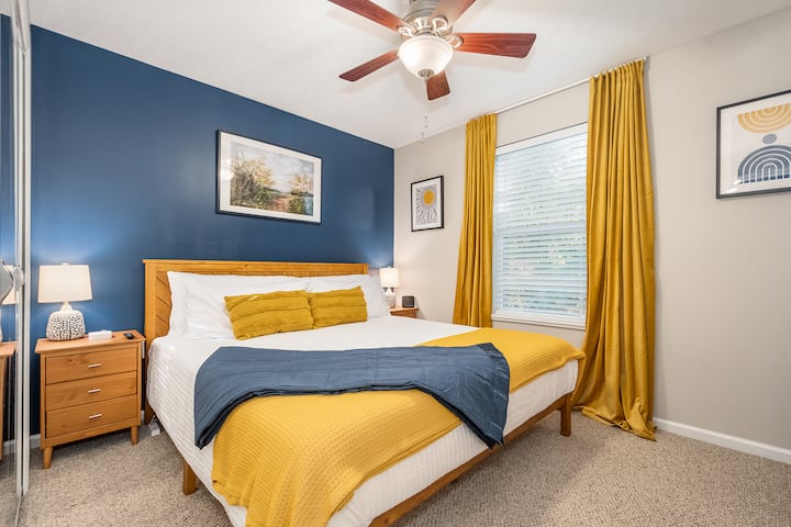 Bedroom 1 - King Size Bed with a mounted 43" Roku TV to stream on all your entertainment apps.