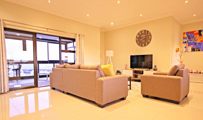 WavesEdge Sunset View ~Nagomi Penthouse in Big Bay gallery image 2