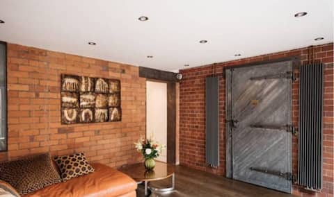 Top performing Airbnb: The Bank Vault West Didsbury featured in the Press in Withington