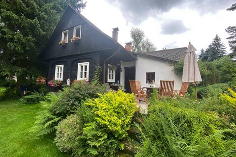 Traditional timbered cottage in Chřibská town