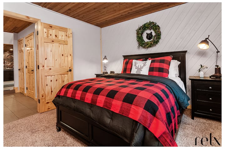 Our main, first floor bedroom is the only bedroom downstairs and is just off of the entry foyer to the left.  Queen bed. 