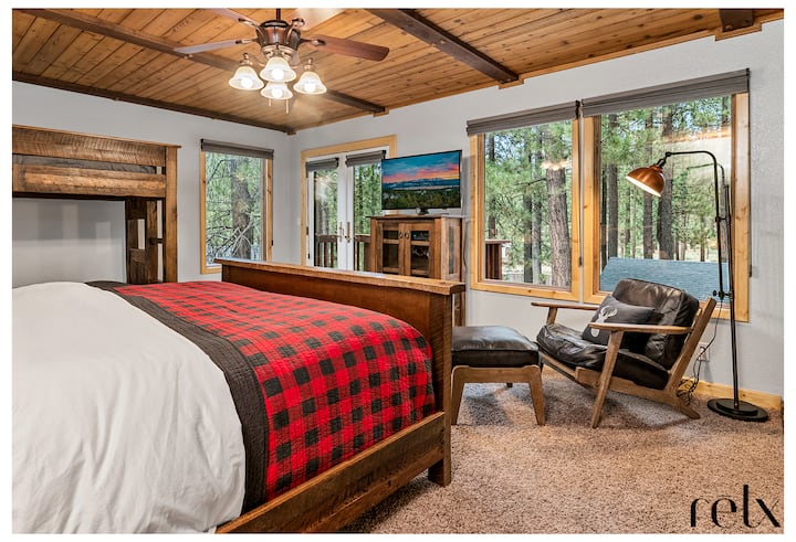 Our primary bedroom boasts a large king bed, a small private patio and a large en suite bathroom.  Perfect for couples - or - if you have young children, there is also a bunk bed to keep them close.