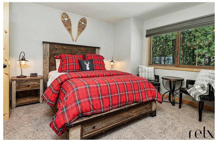  Our second upstairs bedroom, with a queen bed, large tv, queen bed and Jack & Jill bathroom.