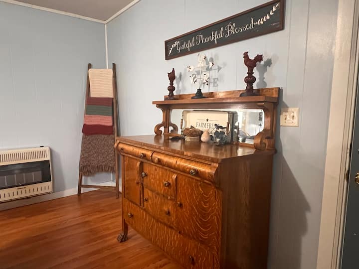 This is a family piece that has found a home at the ChickInn. It holds a treasure trove of boardgames, books, crosswords, puzzles and DVDs.