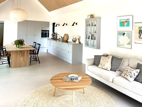 Architect-designed summerhouse near delicious sandy beach.