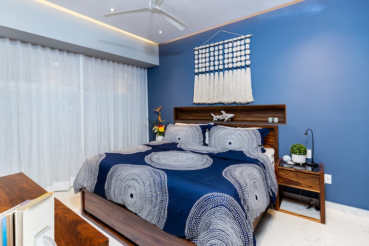 Private, secluded Bedroom with a King Sized Bed, upgraded pillow top mattress and custom made furniture.