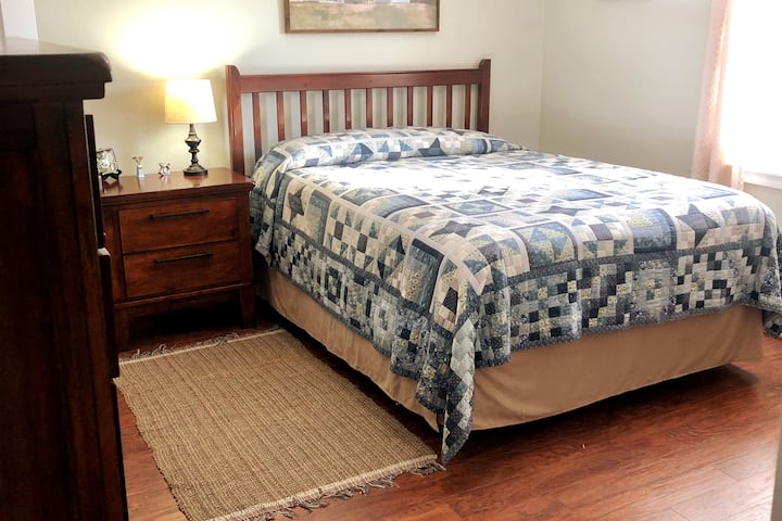 Master bedroom with a view of the fields.