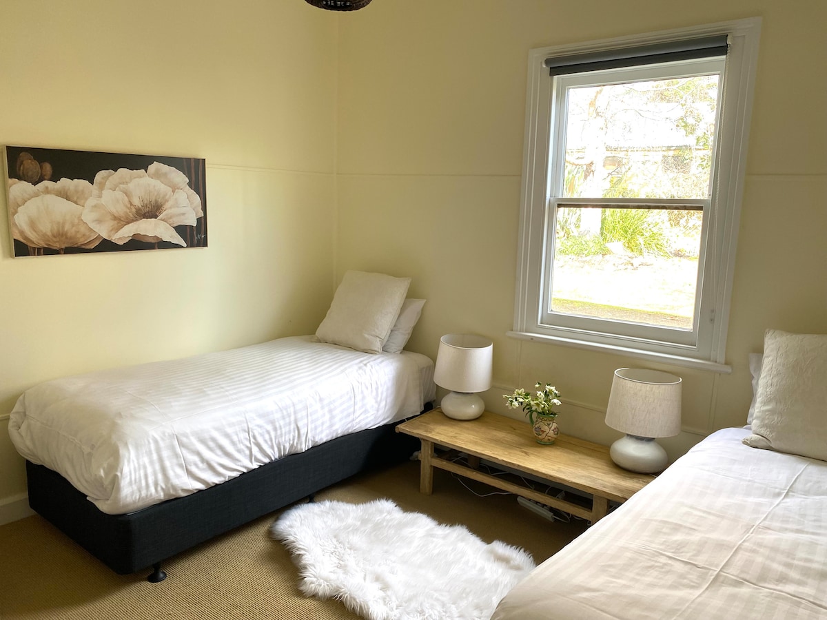 Bedroom two, long singles, can convert to king.