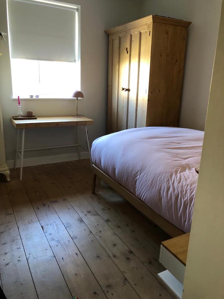 This is a bedroom on the return that has a double bed