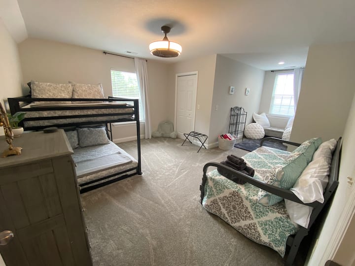 Upstairs bedroom with 2 fullsize bunk beds and a twin size day bed. This room also has a play/reading nook. Bunk beds are both memory foam mattresses and have memory foam and hypo-allergenic goose down alternative pillows. 
