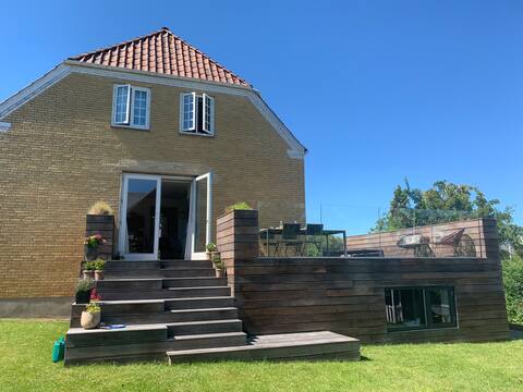 Bright and lovely house with garden and several terraces