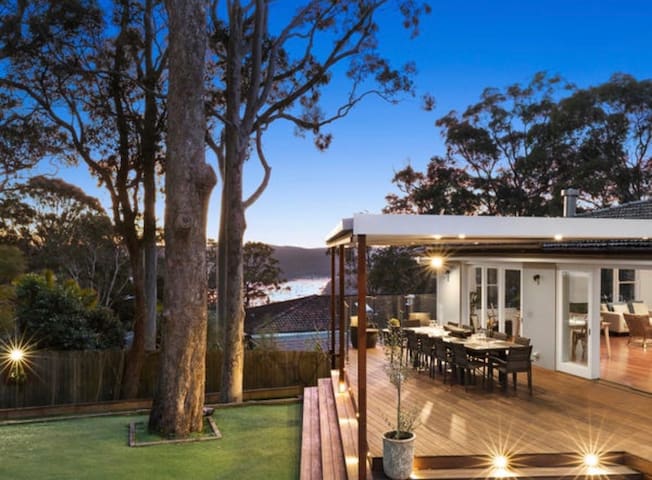 Beautiful family home with a pool and water views