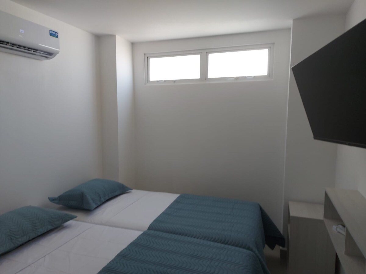 bedroom 2,  two Twin beds, AC and 40 "Smart TV with netflix and disney+