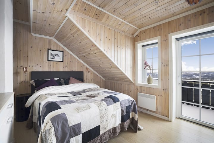 Bedroom 1, with exit to porch. 