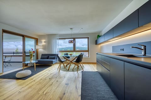 Apartment with a view of the surrounding mountains