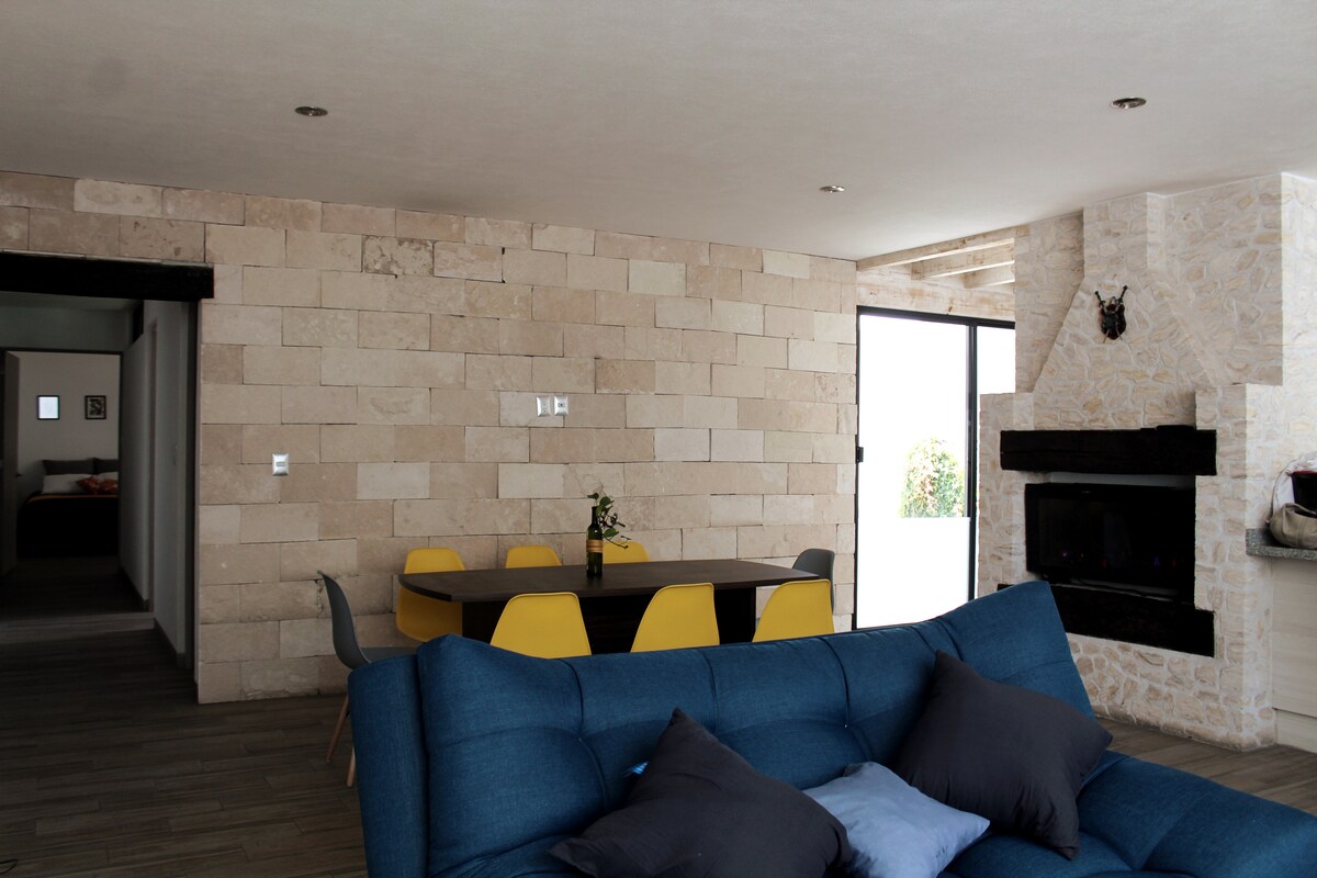 Top Airbnb: Large apartment on the ground floor, with an indoor fireplace. in Arboledas