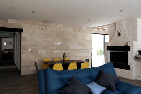Top Airbnb: Large apartment on the ground floor, with an indoor fireplace. in Arboledas