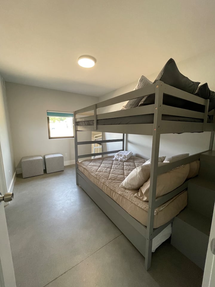 Bunk room features a full-over-full bed with a twin size trundle bed. All mattresses are memory foam with luxury linen.