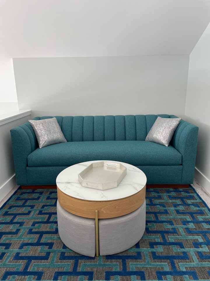 Queen sleeper sofa with memory foam mattress.