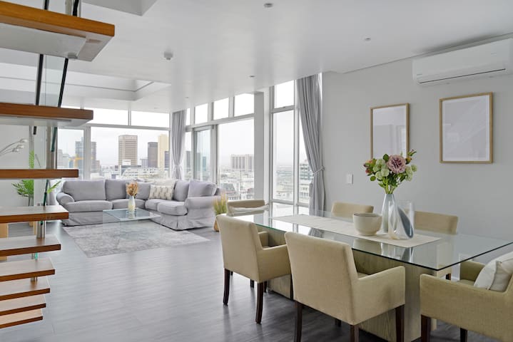 Designer PH with 180° views of City, Mntn & Ocean.