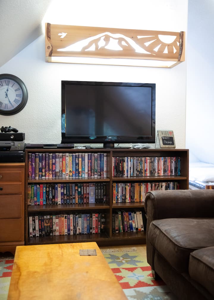 Upstairs loft area with old school dvd's, and vcr movies!