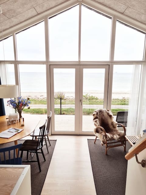 Top Airbnb: Romantic beach house [Front-row ocean view] in Nordfyns