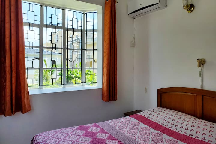 Cozy third bedroom, also with fan and air conditioning