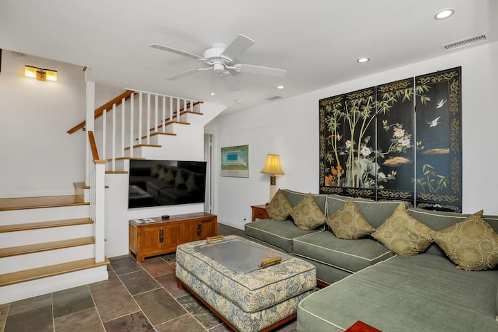 Sink into plush couches and enjoy panoramic vistas of the stunning surroundings, while immersing yourself in your favorite shows or movies.