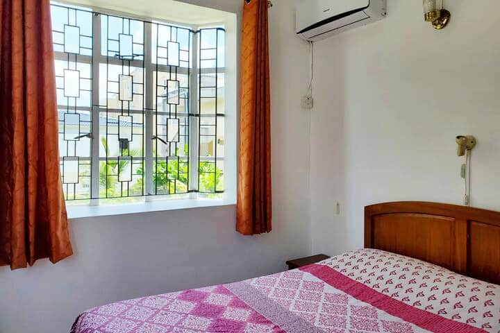 Third bedroom overlooking garden - also has fan and air conditioning