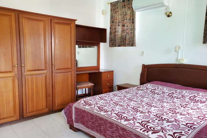 Master bedroom (with balcony) equipped with fan and air conditioning