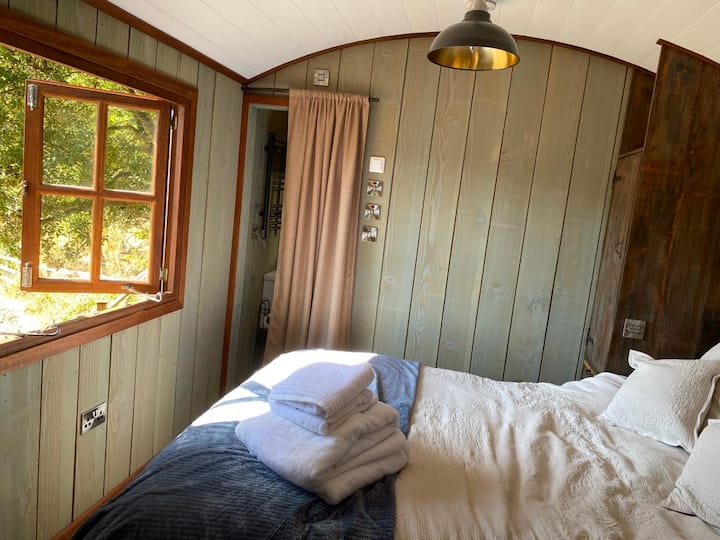 Full-size double bed with en-suite shower room.