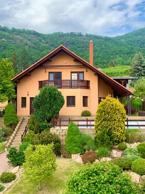Holiday home with heated pool and fireplace