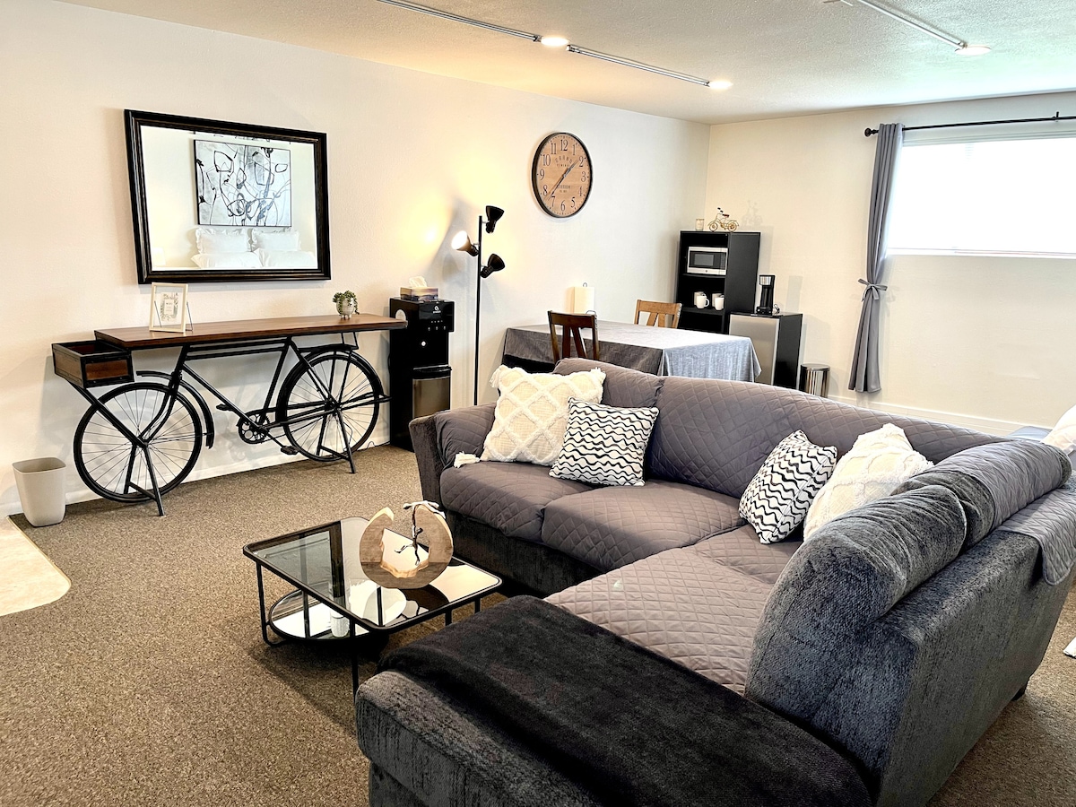 Bedroom #2-  King Bed,  Sectional Couch, Mini Fridge,  Microwave, Coffee, Smart TV, eating/work table, dresser