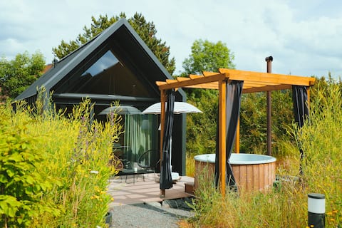 Tiny lodge with terrace and hot tub