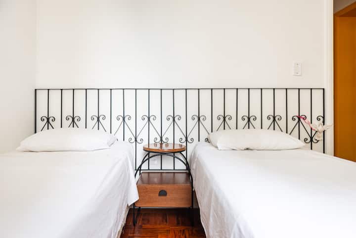 Bedroom 3 - two single beds and ceiling fan