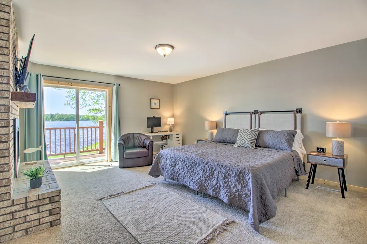 Bedroom 1 | Main Level | King Bed | Desk, monitor, electric fireplace and Roku Smart TV