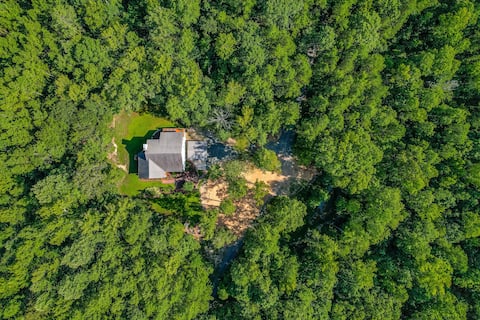 Secluded retreat w/ trails, fire pit, & hammocks