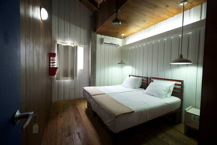 Bedroom 1 - Two single-person beds, 
Outdoor Air Conditioning  
Closet.  
A safety deposit.