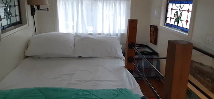 2nd bedroom , located in cupola (involves climbing a ladder) - mattress is 8" thick foam and 40" wide