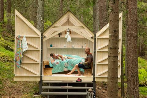 Glasshouse glamping in peaceful forest by a lake