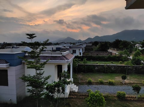 Delightful 1 BHK farm home with public pool