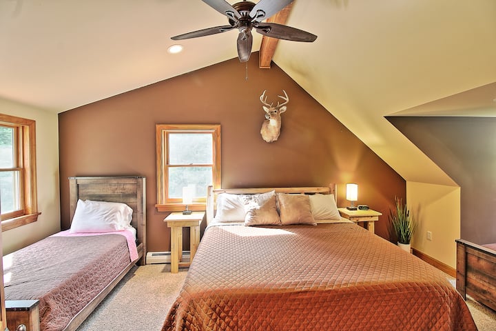 "The Deer Room" includes 2 twin beds and a king, complete with 27" HD TV with Roku and Blu Ray Player, closet and dresser storage, and toys. Great area for a family!