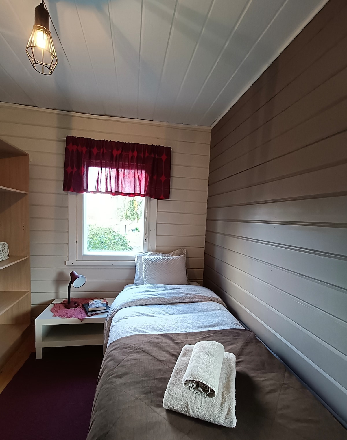 Jednostruka spavaća soba.