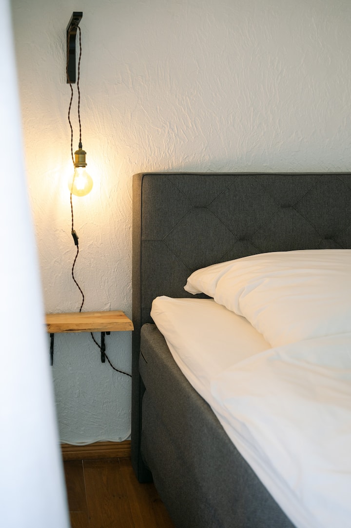 After an active day, let yourself fall into the comfortable, soft box spring bed in the upper bedroom.