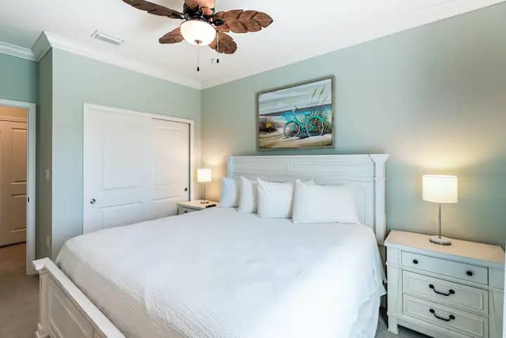 The second bedroom features a king bed with a new Serta Platinum Suite III Euro Top Mattress that provides luxurious comfort, a 55” 4K UHD Smart TV, and a large closet with Closets By Design.
