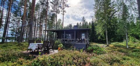 Wilderness log cabin by the lake